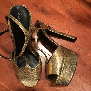 ALDO gold T strap platform heels